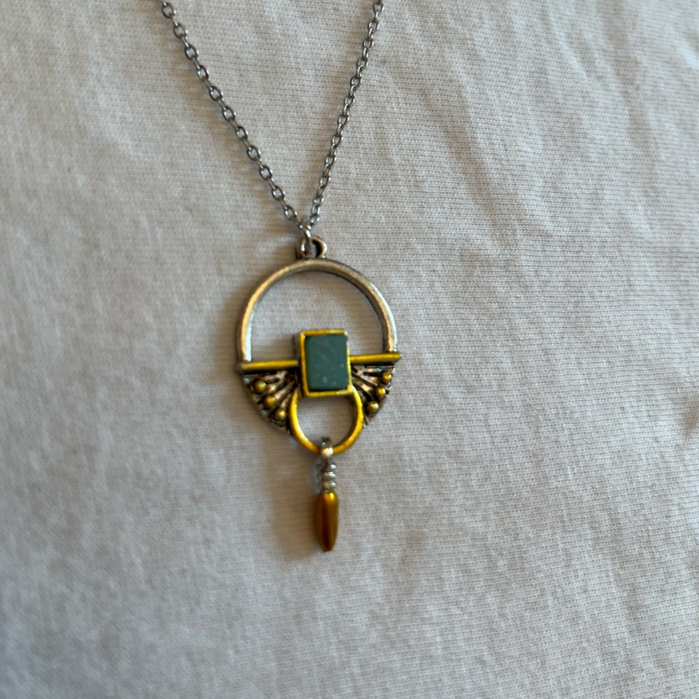 Elegant Gold and Silver Pendant Necklace